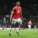 Marcus Rashford celebrates after scoring a goal for Manchester United.