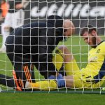 Manchester United goalkeeper David de Gea in pain after colliding with the goal-post in an attempt to save Ward-Prowse's free-kick. (GETTY Images)