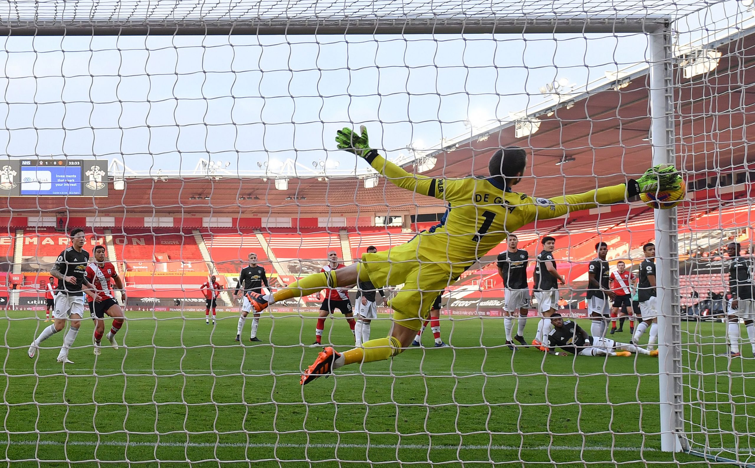 David de Gea attempts to save a shot against Southampton. (Photo by MIKE HEWITT/POOL/AFP via Getty Images)