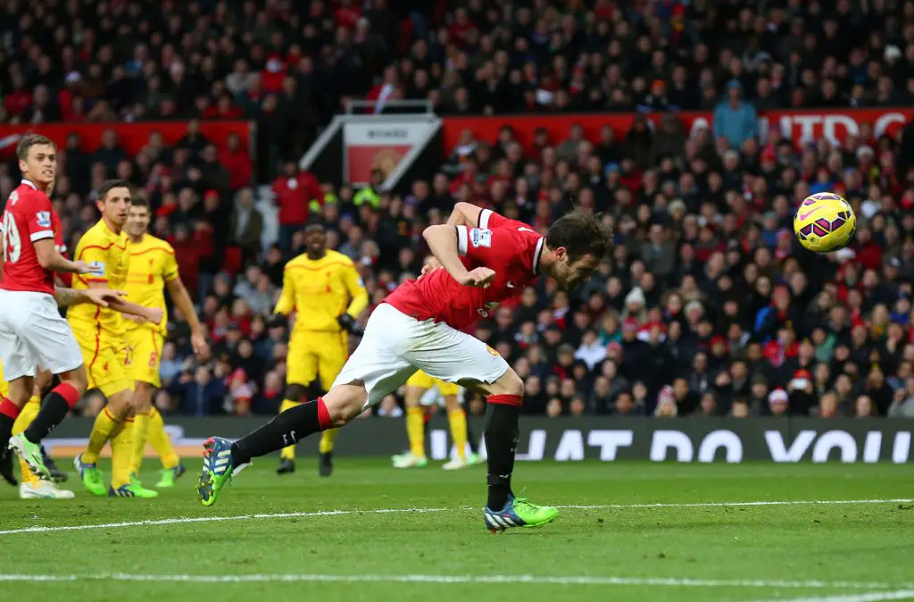 Juan Mata heads United's second goal against Liverpool. (GETTY Images)