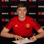 Nathan Bishop signs a contract with Manchester United at ATC on 30 January 2020. Photographer: Ashley Donelon. (Manchester United website)