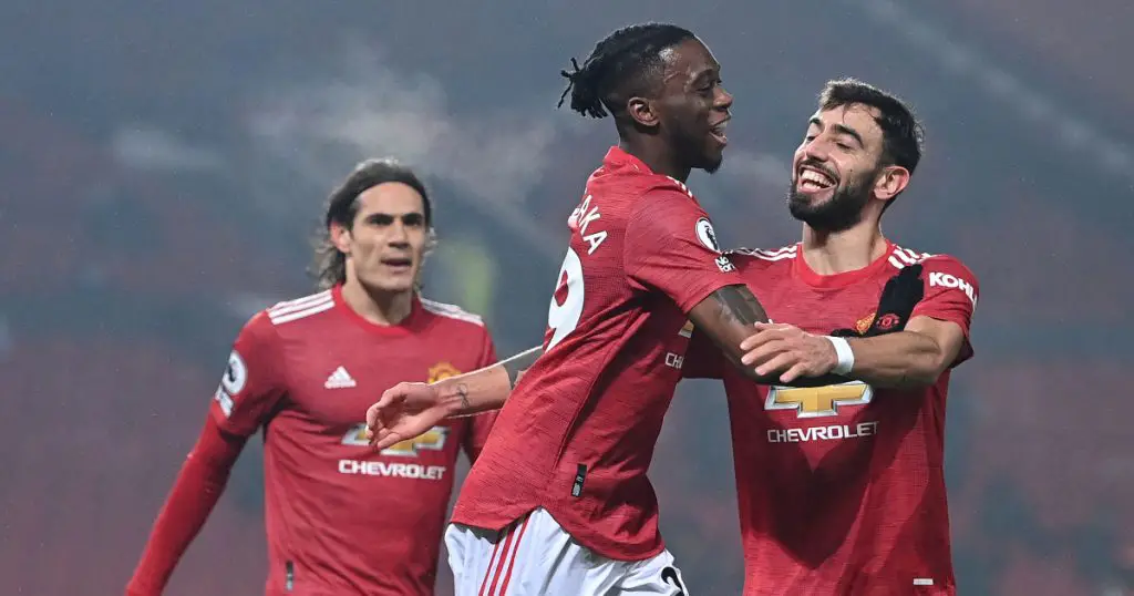 Aaron Wan-Bissaka and Bruno Fernandes in action for Manchester United.