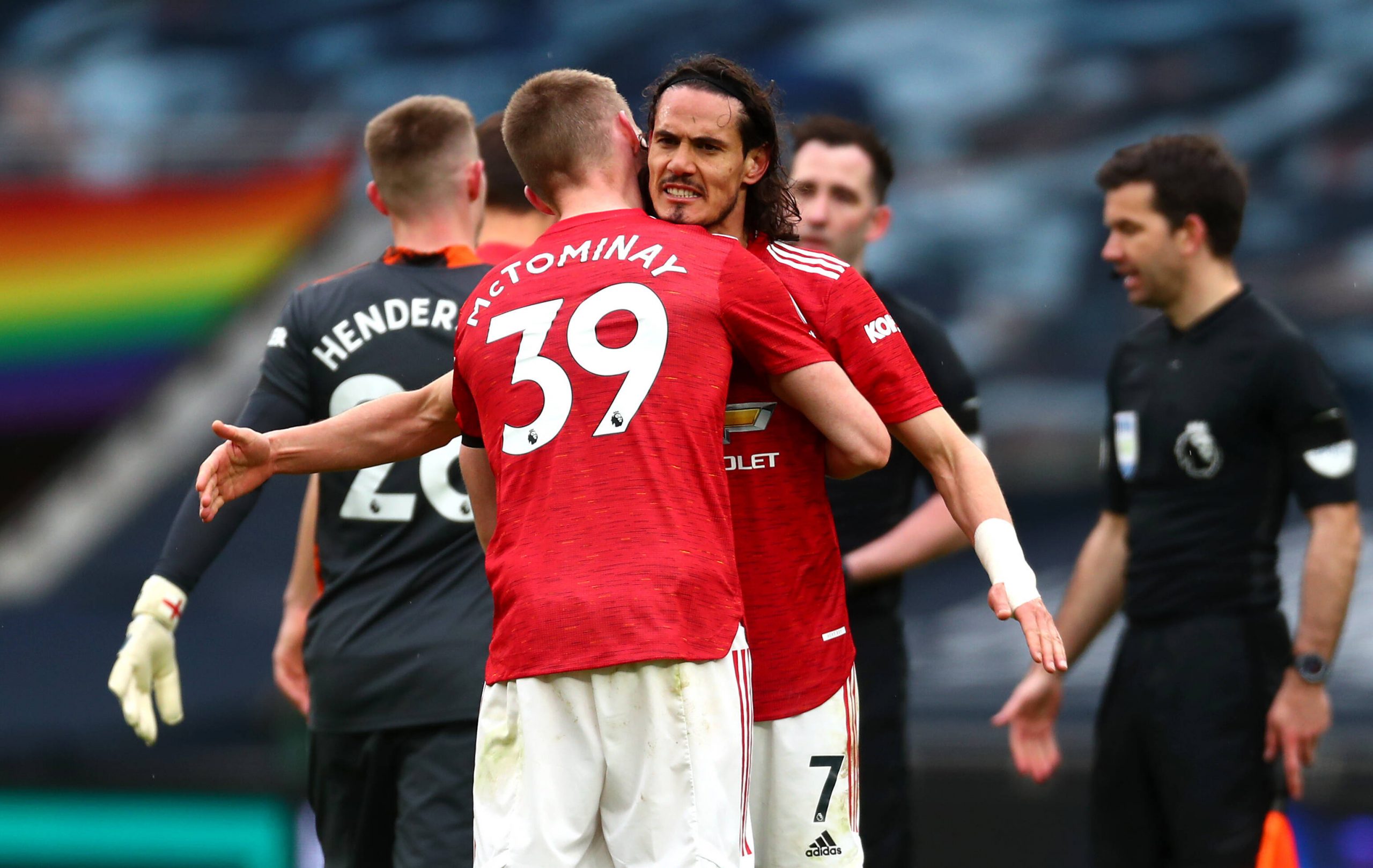 Scott McTominay and Edinson Cavani in action for Manchester United.