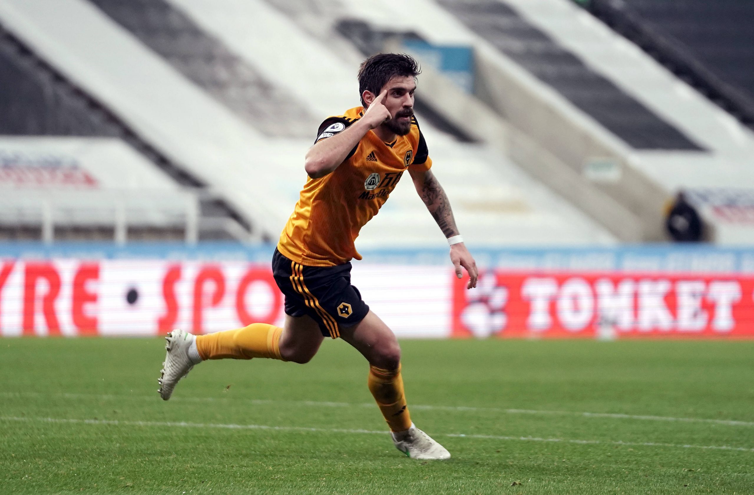 Ruben Neves celebrates scoring a goal for Wolverhampton Wanderers.