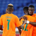 Eric Bailly (R) and Amad Diallo (not in picture) of Manchester United for Ivory Coast against Brazil at the 2020 Tokyo Olympics.