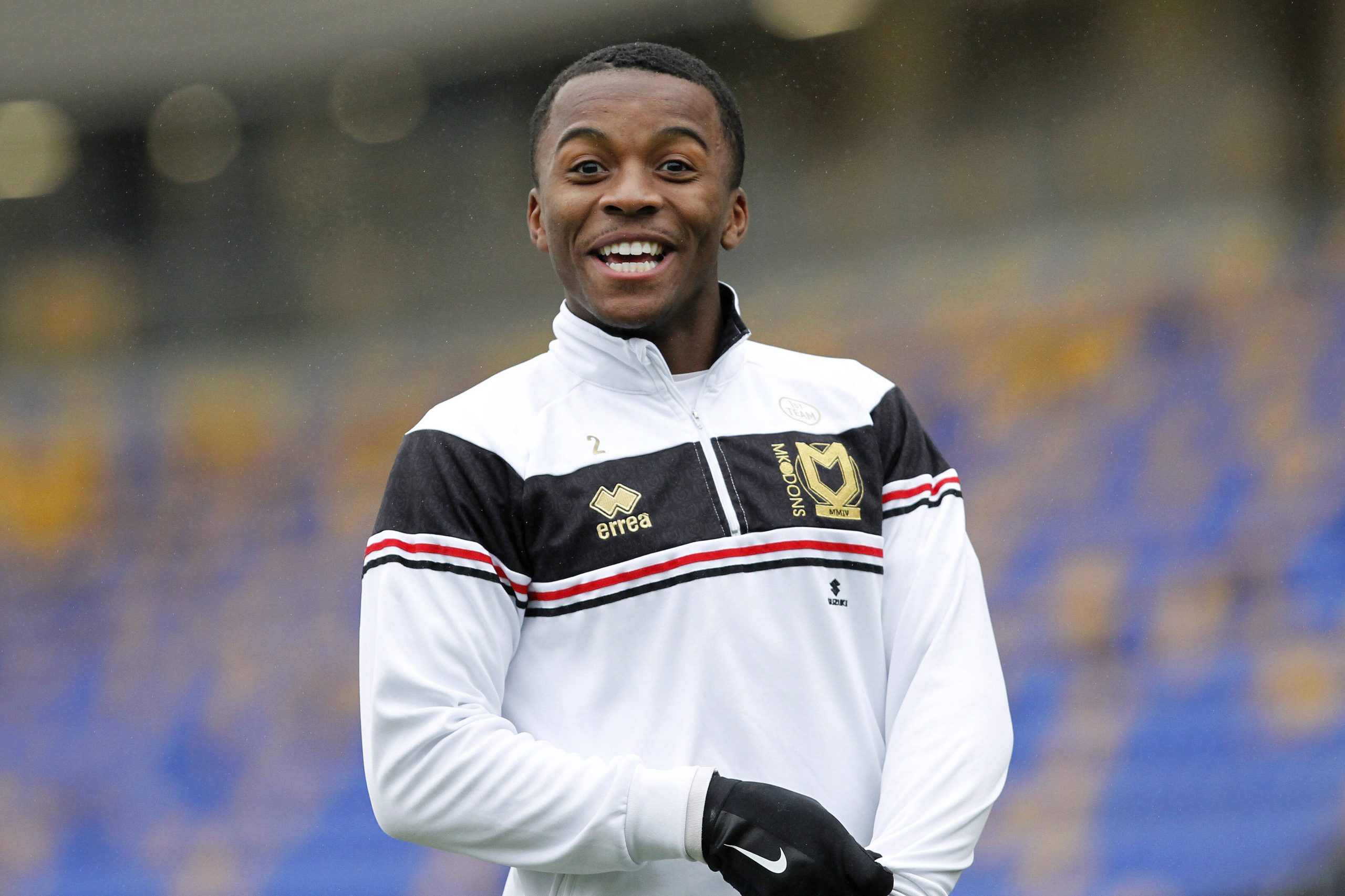 Ethan Laird all smiles at MK Dons.