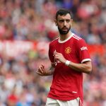 Midfielder Bruno Fernandes reacts to signing a new contract at Manchester United until 2026.
