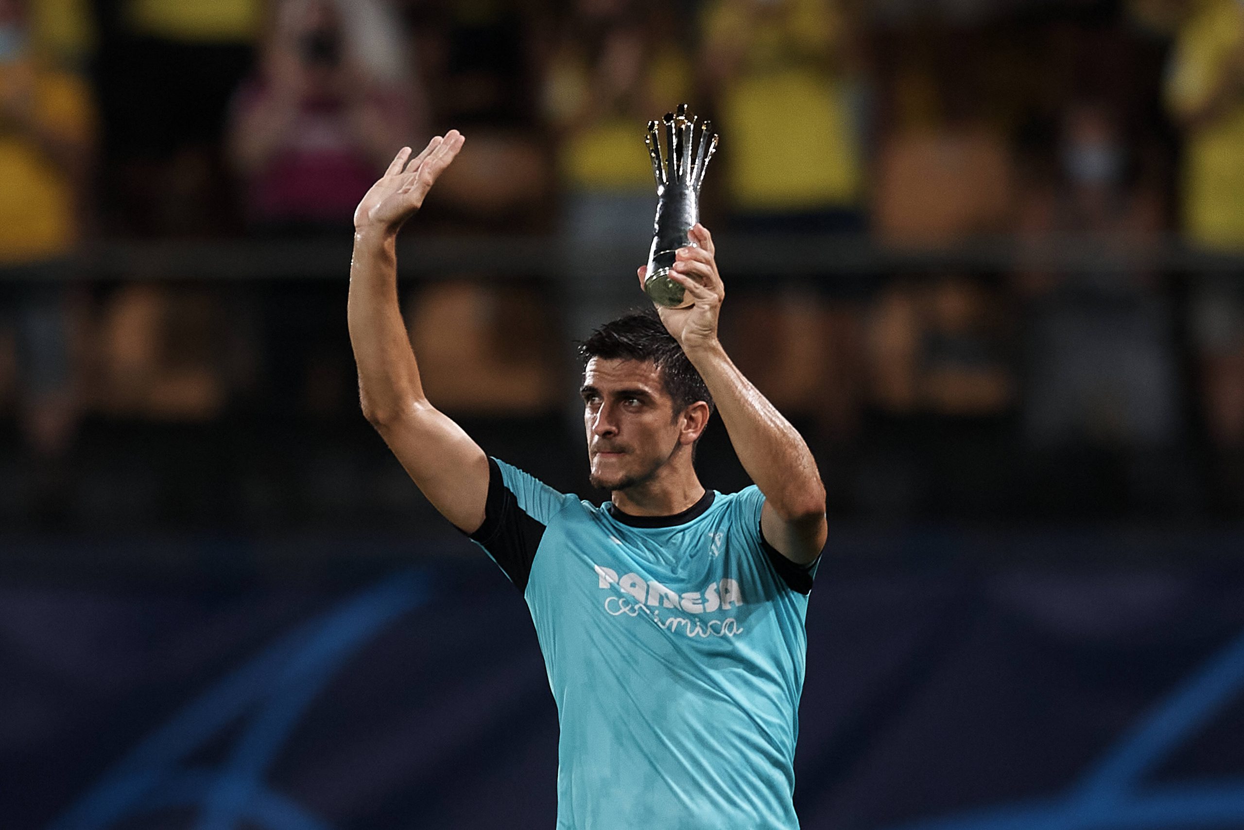 Gerard Moreno with the Europa League MVP trophy prior to the UEFA Champions League group F match between Villarreal CF and Atalanta.