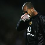 Tim Howard of Manchester United looks dejected during the UEFA Champions League Group D match between Olympique Lyonnais and Manchester United. (Photo by Shaun Botterill/Getty Images)
