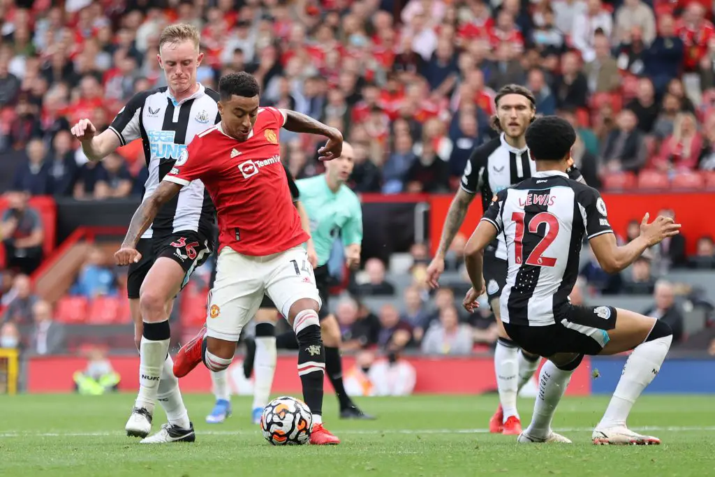 Jesse Lingard of Manchester United scores the fourth goal during the Premier League match between Manchester United and Newcastle United at Old Trafford. 