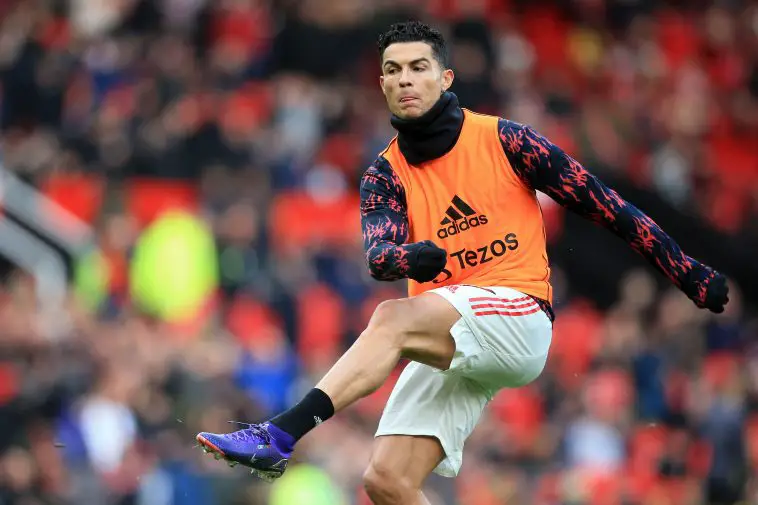 Cristiano Ronaldo warming up for Manchester United. (Photo by LINDSEY PARNABY/AFP via Getty Images)