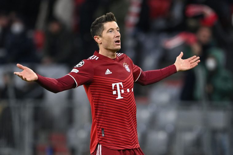 Robert Lewandowski in action for Bayern Munich. (Photo by CHRISTOF STACHE/AFP via Getty Images)