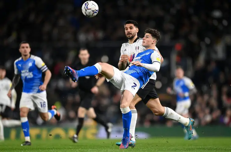 Ronnie Edwards of Peterborough United battles for possession with Aleksandar Mitrovic of Fulham. (Photo by Alex Davidson/Getty Images)