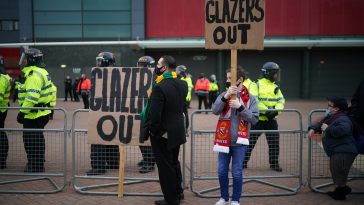Fans protest outside Old Trafford Stadium ahead of the Premier League match between Manchester United and Liverpool. (Photo by Christopher Furlong/Getty Images)