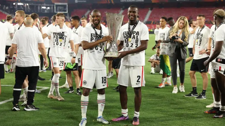 Almamy Toure and Evan Ndicka of Eintracht Frankfurt pose with the UEFA Europa League Trophy. (Photo by Alex Grimm/Getty Images)