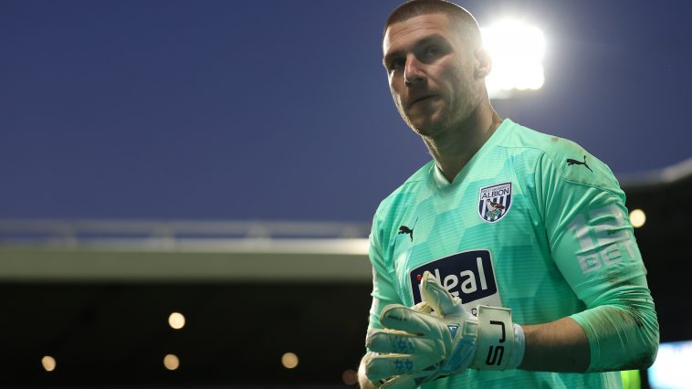 Sam Johnstone of West Bromwich Albion looks on during a PL match against West Ham United. (Photo by Molly Darlington - Pool/Getty Images)