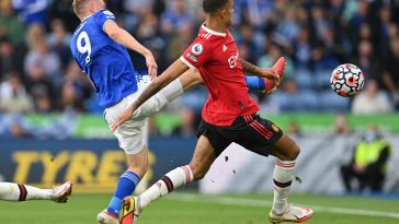 Jamie Vardy in action against Manchester United's Mason Greenwood