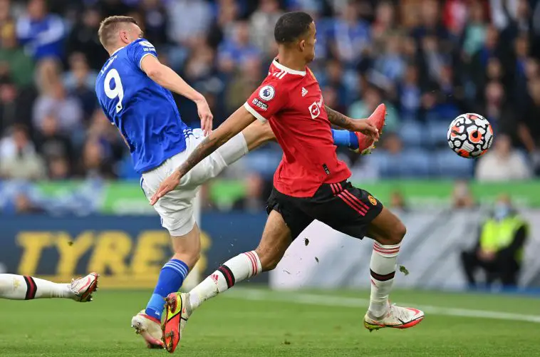 Jamie Vardy in action against Manchester United's Mason Greenwood