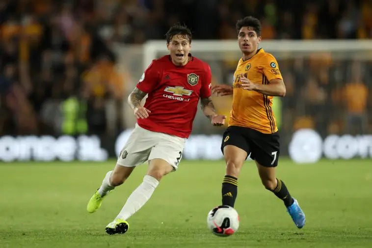 Victor Lindelof of Manchester United and Pedro Neto of Wolverhampton Wanderers in action during a Premier League match. (Photo by David Rogers/Getty Images)