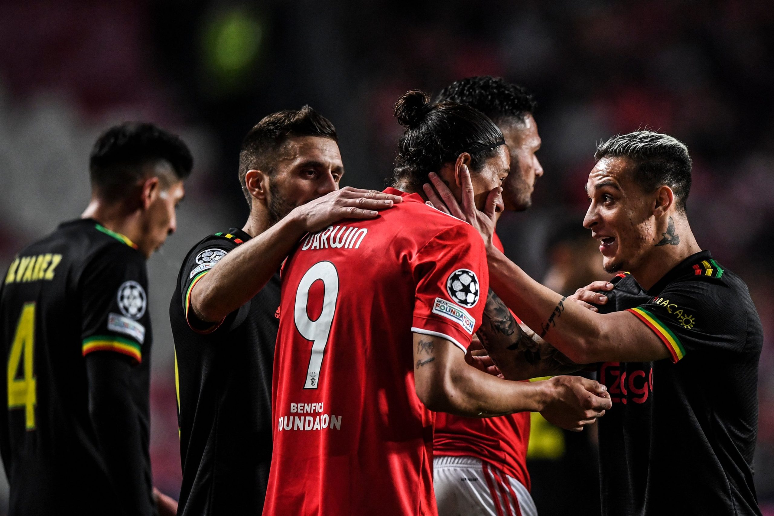 Darwin Nunez (L) with Ajax's Antony. (Photo by PATRICIA DE MELO MOREIRA/AFP via Getty Images)