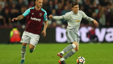 Marko Arnautovic of West Ham United and Victor Lindelof of Manchester United in action.