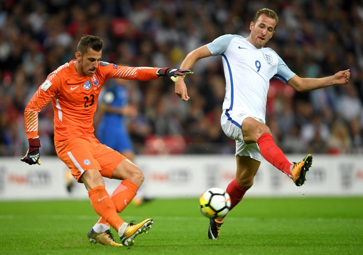 Harry Kane of England attempts to block Martin Dubravka of Slovakia during the FIFA 2018 World Cup Qualifier.