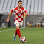 Josip Juranovic runs with the ball during the friendly match between Croatia and Slovenia.