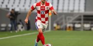 Josip Juranovic runs with the ball during the friendly match between Croatia and Slovenia.