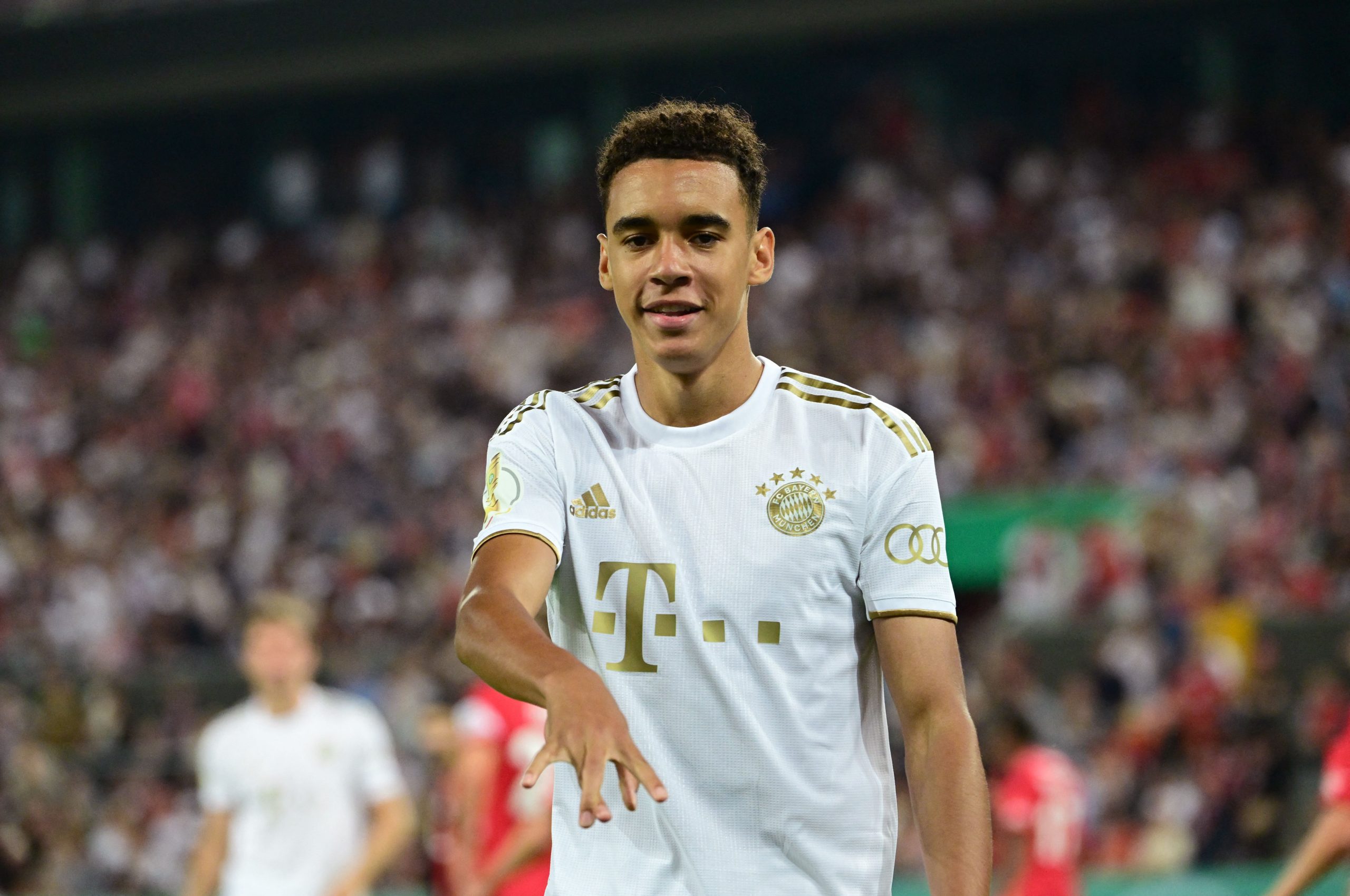 Jamal Musiala in action for Bayern Munich. (Photo by INA FASSBENDER/AFP via Getty Images)