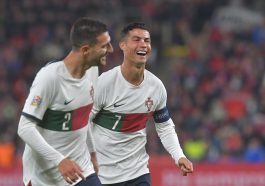 Cristiano Ronaldo celebrates with Portugal and Manchester United teammate, Diogo Dalot.