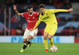 Pau Torres of Villarreal CF battles for possession with Bruno Fernandes of Manchester United during a UEFA Champions League group F match.