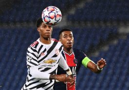 Manchester United's Marcus Rashford vies for the ball with Paris Saint-Germain's Presnel Kimpembe .