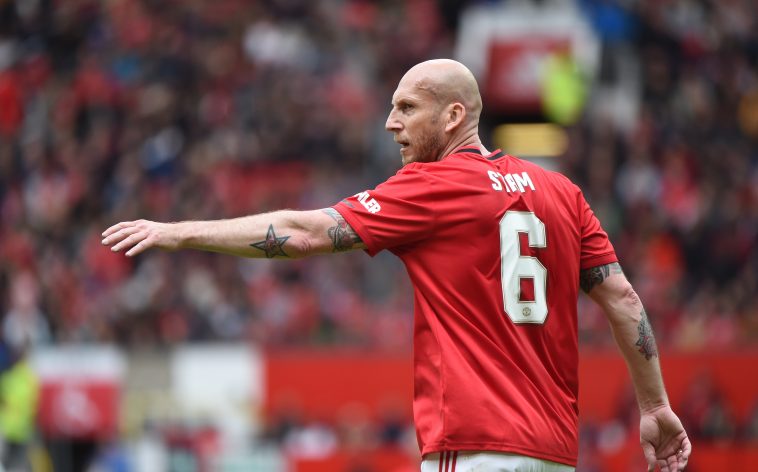 Jaap Stam looks on during the Manchester United '99 Legends v FC Bayern Legends at Old Trafford in May 2019.