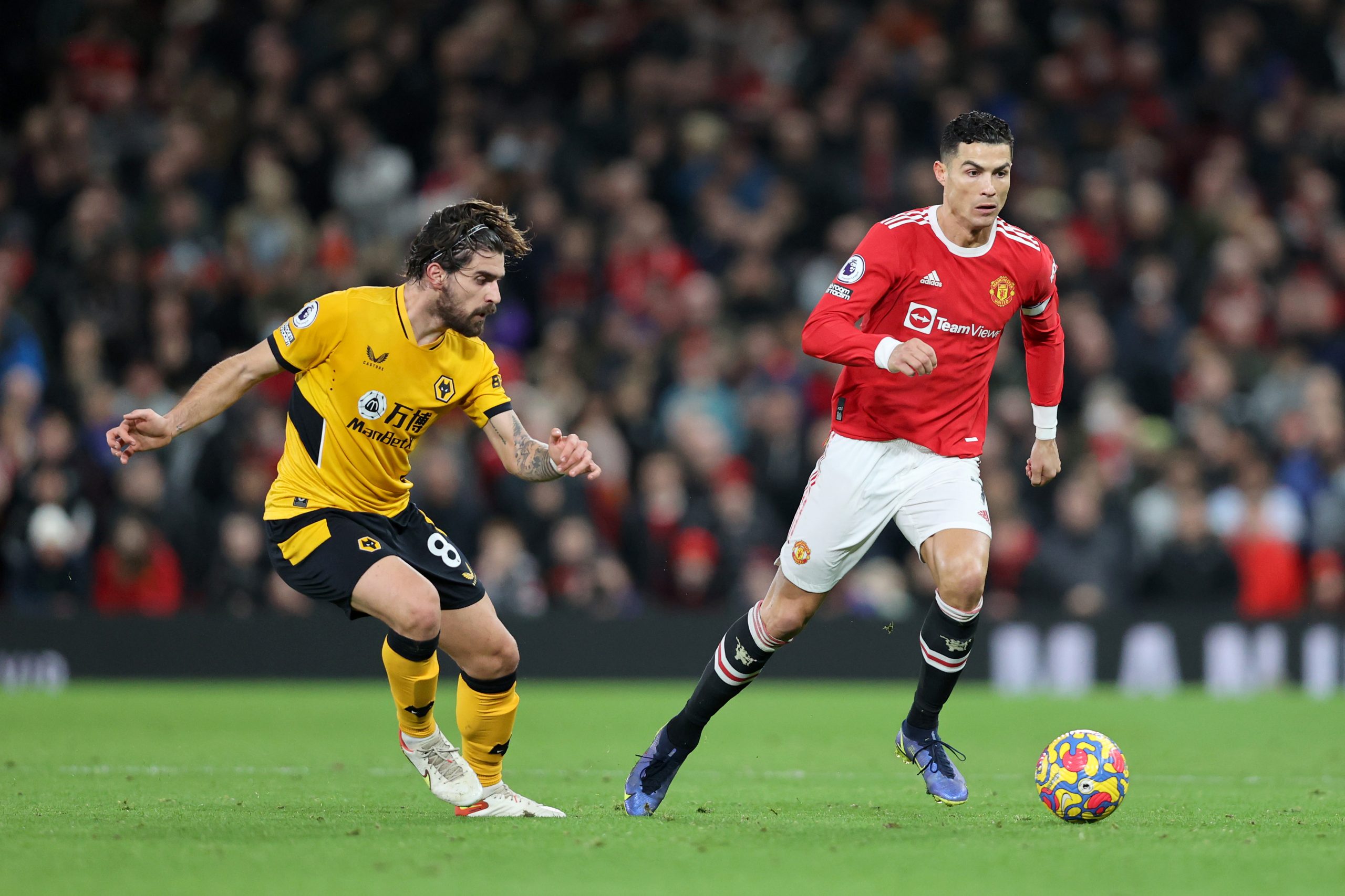Cristiano Ronaldo of Manchester United in action against Wolves' Ruben Neves.