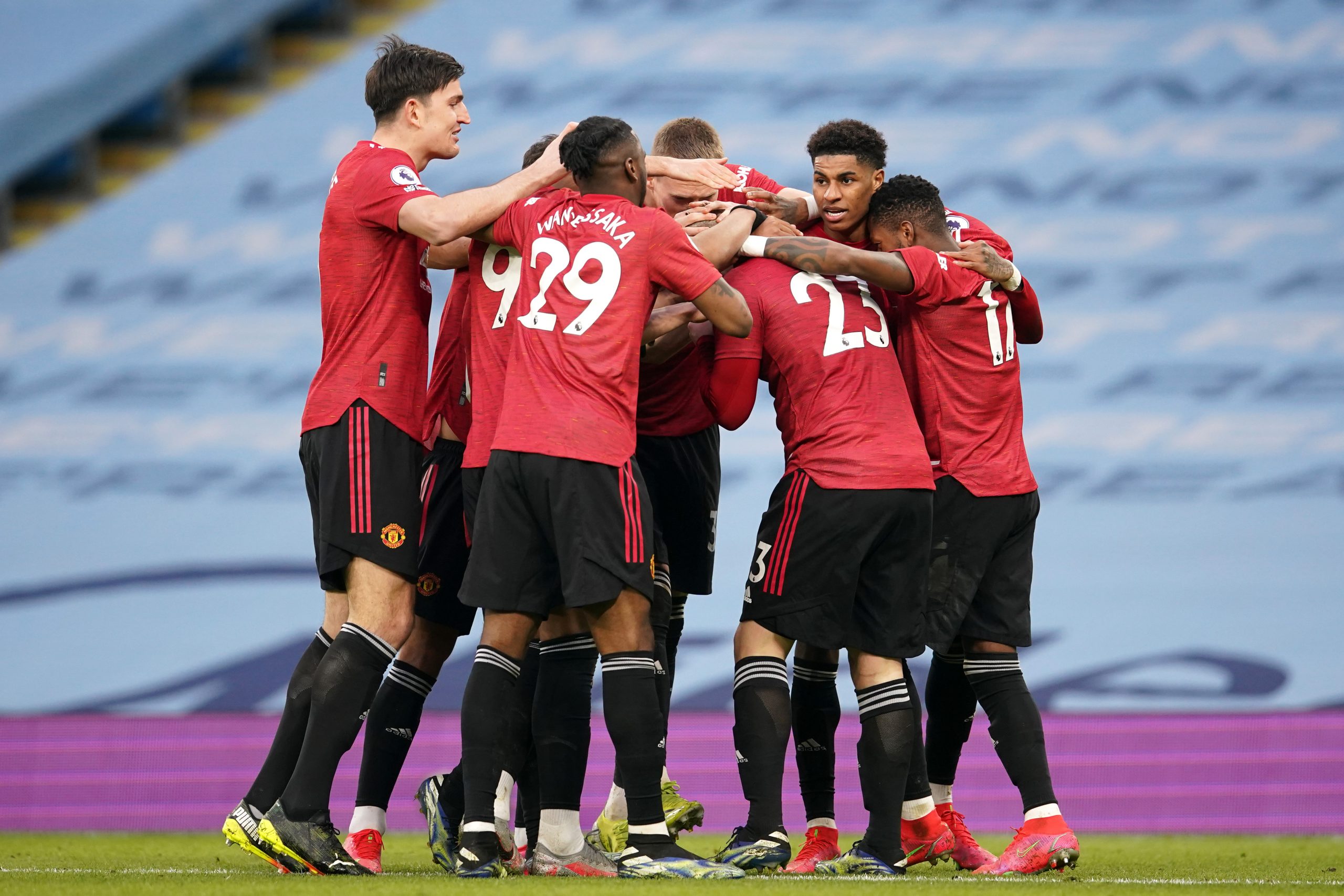 Luke Shaw of Manchester United celebrates with Harry Maguire, Anthony Martial, Aaron Wan-Bissaka, Marcus Rashford and Fred after scoring against Manchester City in the derby.