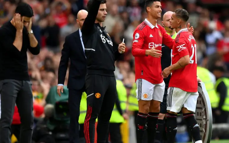 Antony and Cristiano Ronaldo for Manchester United as Mikel Arteta, manager of Arsenal, looks on. (Photo by Shaun Botterill/Getty Images)