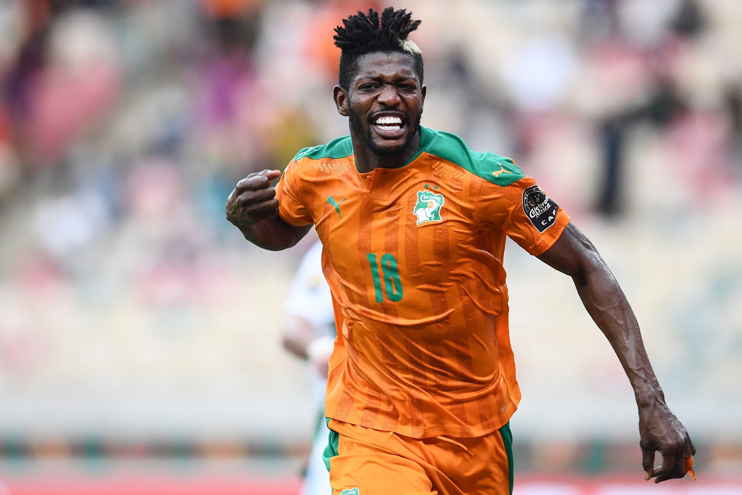 Ibrahim Sangare celebrates scoring a goal for Ivory Coast.