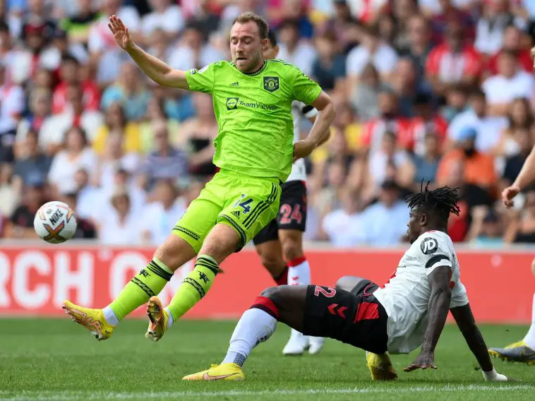 Christian Eriksen of Manchester United is fouled by Mohammed Salisu of Southampton.