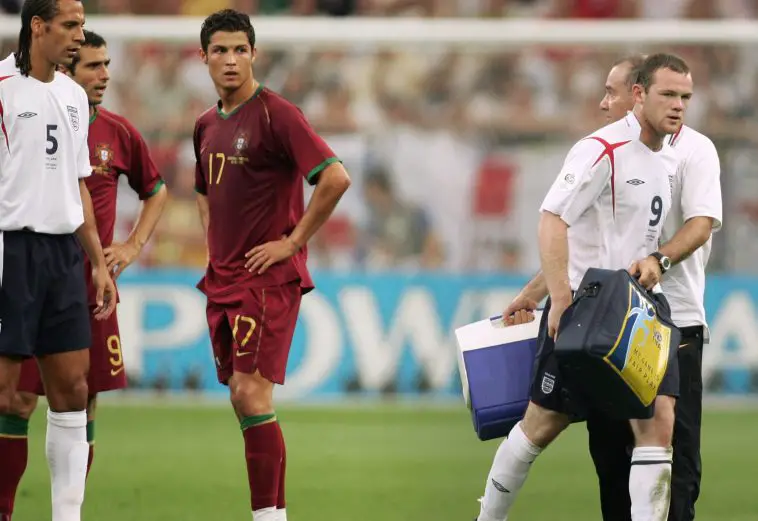 Wayne Rooney of England and Cristiano Ronaldo of Portugal during a FIFA World Cup 2006 match. (Photo by ADRIAN DENNIS/AFP via Getty Images)