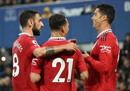 Cristiano Ronaldo celebrates with Manchester United teammates, Antony and Bruno Fernandes, after scoring against Everton.