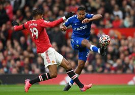Jose Salomon Rondon of Everton battles for possession with Raphael Varane of Manchester United during a league match in October 2021.
