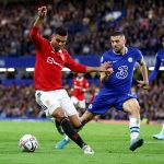 Casemiro of Manchester United battles for possession with Mateo Kovacic of Chelsea.