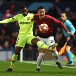 Barcelona's Nelson Semedo vies with Manchester United's Diogo Dalot during a UEFA Champions League game in April 2019.
