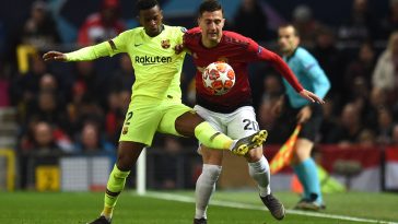 Barcelona's Nelson Semedo vies with Manchester United's Diogo Dalot during a UEFA Champions League game in April 2019.