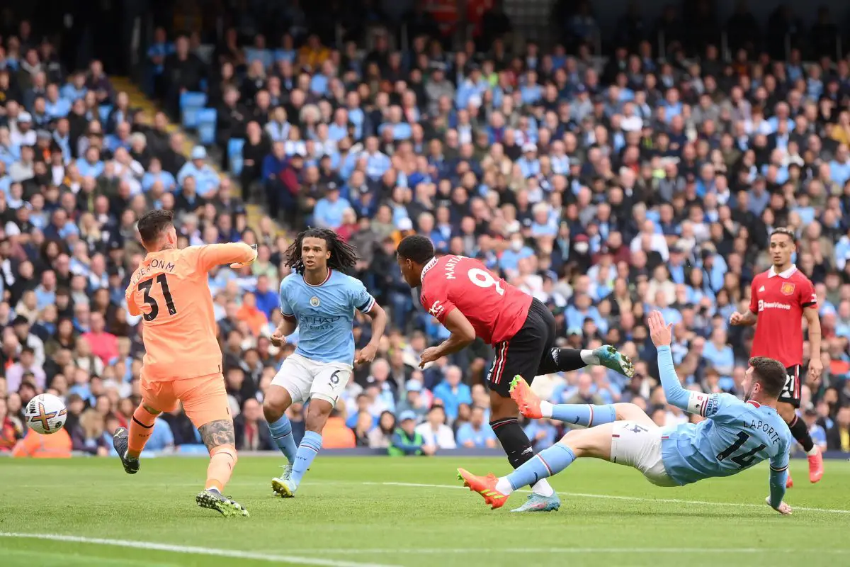 Anthony Martial of Manchester United scores past Ederson Moraes of Manchester City. 