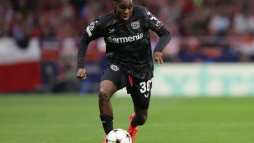 Jeremie Frimpong of Bayer 04 Leverkusen controls the ball during the UEFA Champions League group B match between Atletico Madrid and Bayer 04 Leverkusen at Civitas Metropolitano Stadium on October 26, 2022 in Madrid, Spain