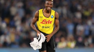 Victor Osimhen of SSC Napoli celebrates the victory after the Serie A match between SSC Napoli and Bologna FC at Stadio Diego Armando Maradona on October 16, 2022 in Naples, Italy.