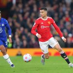 Cristiano Ronaldo of Manchester United runs with ball as Reece James of Chelsea gives chase. (Photo by Alex Livesey/Getty Images)