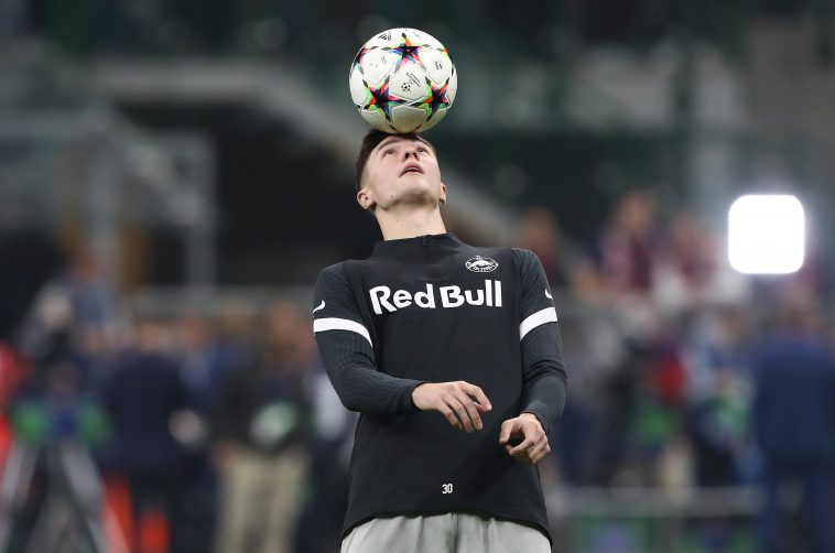 Benjamin Sesko of FC Salzburg warms up prior to the UEFA Champions League group E match between AC Milan and FC Salzburg at Giuseppe Meazza Stadium on November 02, 2022 in Milan, Italy
