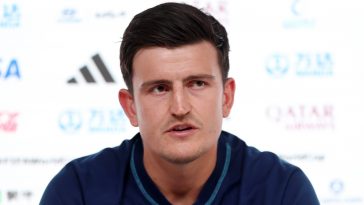 Harry Maguire of England speaks during the England Press Conference at the Main Media Center on November 24, 2022 in Doha, Qatar